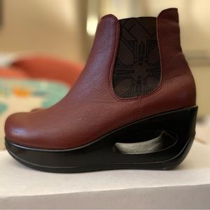 Like new Fly London cutout wedge boots